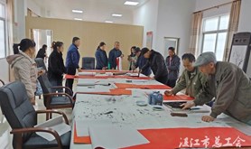 遂溪县总工会开展书法家进企业送春联活动