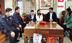 吴川市总工会慰问因公牺牲公安民警家庭