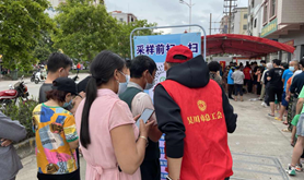 吴川市总工会干部职工下沉一线参与抗疫