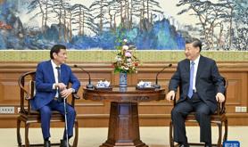 习近平会见菲律宾前总统杜特尔特